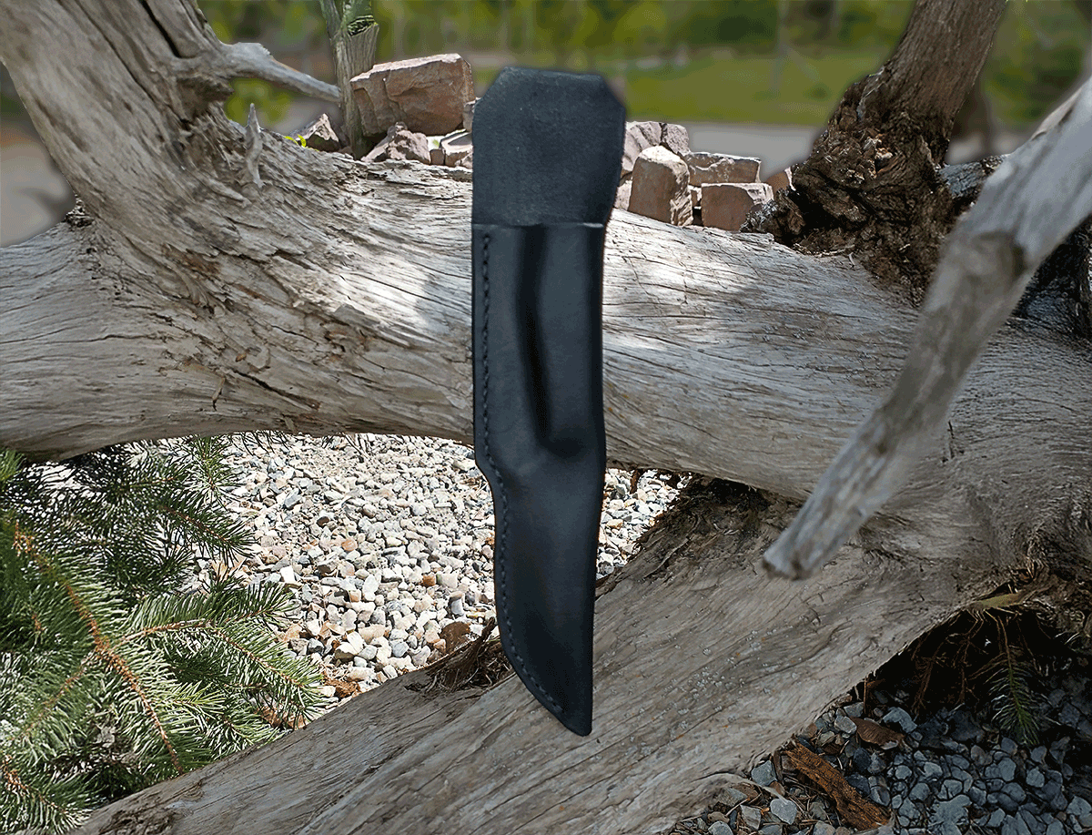 a custom leather sheath resting on an aged piece of wood